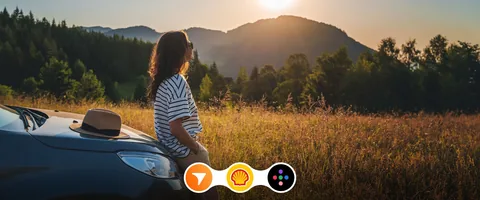A woman beside a car at sunset above the Tangerine, Shell and Scene+ logos.