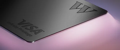 A close-up of a metal Wealthsimple credit card.